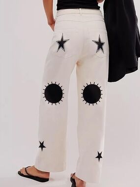 Chic Nation White Wide-Leg Jeans with Black Star & Sun Motifs